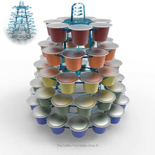 Nespresso original line coffee pod tower stand with rotating rings, shown in cool blue tint acrylic