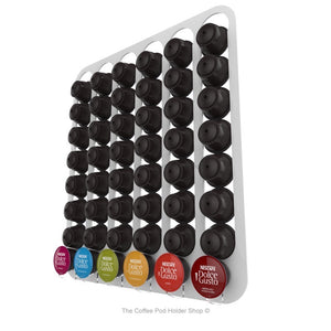 White, magnetic Dolce Gusto coffee pod capsule holder with pre-installed neodymium magnets. Holds 48 pods in 6 rows.
