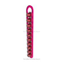 Pink, wall mounted, self adhesive Nespresso original line coffee pod capsule holder. Holds 10 pods in 1 row.