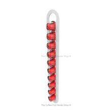 White, wall mounted, self adhesive Nespresso original line coffee pod capsule holder. Holds 10 pods in 1 row.