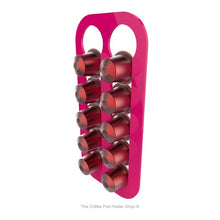 Pink, wall mounted, self adhesive Nespresso original line coffee pod capsule holder. Holds 10 pods in 2 rows.