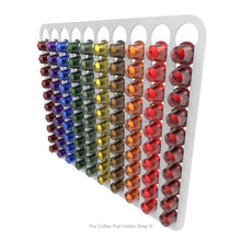 White, wall mounted, self adhesive Nespresso original line coffee pod capsule holder. Holds 100 pods in 10 rows.
