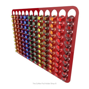 Red, wall mounted, self adhesive Nespresso original line coffee pod capsule holder. Holds 120 pods in 12 rows.