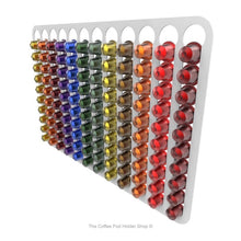 White, wall mounted, self adhesive Nespresso original line coffee pod capsule holder. Holds 120 pods in 12 rows.