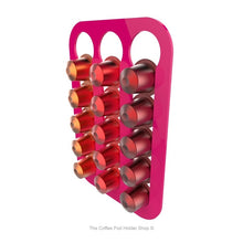 Pink, wall mounted, self adhesive Nespresso original line coffee pod capsule holder. Holds 15 pods in 3 rows.