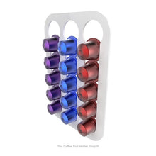 White, wall mounted, self adhesive Nespresso original line coffee pod capsule holder. Holds 15 pods in 3 rows.