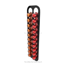 Black, wall mounted, self adhesive Nespresso original line coffee pod capsule holder. Holds 20 pods in 2 rows.