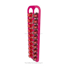 Pink, wall mounted, self adhesive Nespresso original line coffee pod capsule holder. Holds 20 pods in 2 rows.