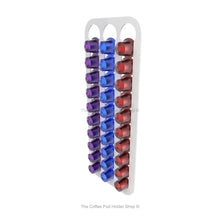 White, wall mounted, self adhesive Nespresso original line coffee pod capsule holder. Holds 30 pods in 3 rows.