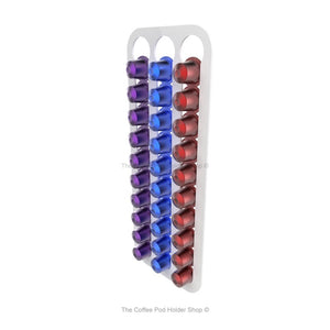 White, wall mounted, self adhesive Nespresso original line coffee pod capsule holder. Holds 30 pods in 3 rows.