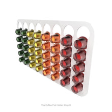 White, wall mounted, self adhesive Nespresso original line coffee pod capsule holder. Holds 40 pods in 8 rows.