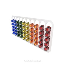 White, wall mounted, self adhesive Nespresso original line coffee pod capsule holder. Holds 50 pods in 10 rows.