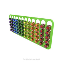 Lime, wall mounted, self adhesive Nespresso original line coffee pod capsule holder. Holds 60 pods in 12 rows.