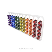 White, wall mounted, self adhesive Nespresso original line coffee pod capsule holder. Holds 60 pods in 12 rows.