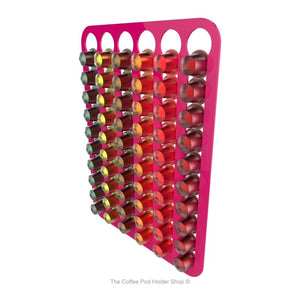 Pink, wall mounted, self adhesive Nespresso original line coffee pod capsule holder. Holds 60 pods in 6 rows.