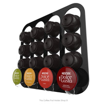 Black, wall mounted, self adhesive Dolce Gusto coffee pod capsule holder. Holds 16 pods in 4 rows.