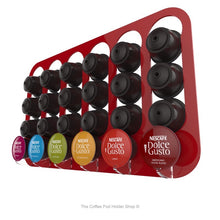 Red, wall mounted, self adhesive Dolce Gusto coffee pod capsule holder. Holds 24 pods in 6 rows.