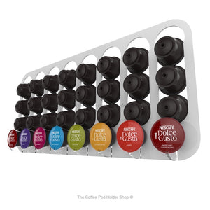 White, wall mounted, self adhesive Dolce Gusto coffee pod capsule holder. Holds 32 pods in 8 rows.