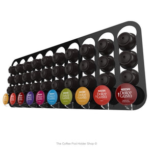 Black, wall mounted, self adhesive Dolce Gusto coffee pod capsule holder. Holds 40 pods in 10 rows.
