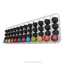 White, wall mounted, self adhesive Dolce Gusto coffee pod capsule holder. Holds 48 pods in 12 rows.