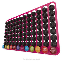 Pink, wall mounted, self adhesive Dolce Gusto coffee pod capsule holder. Holds 96 pods in 12 rows.