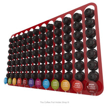 Red, wall mounted, self adhesive Dolce Gusto coffee pod capsule holder. Holds 96 pods in 12 rows.